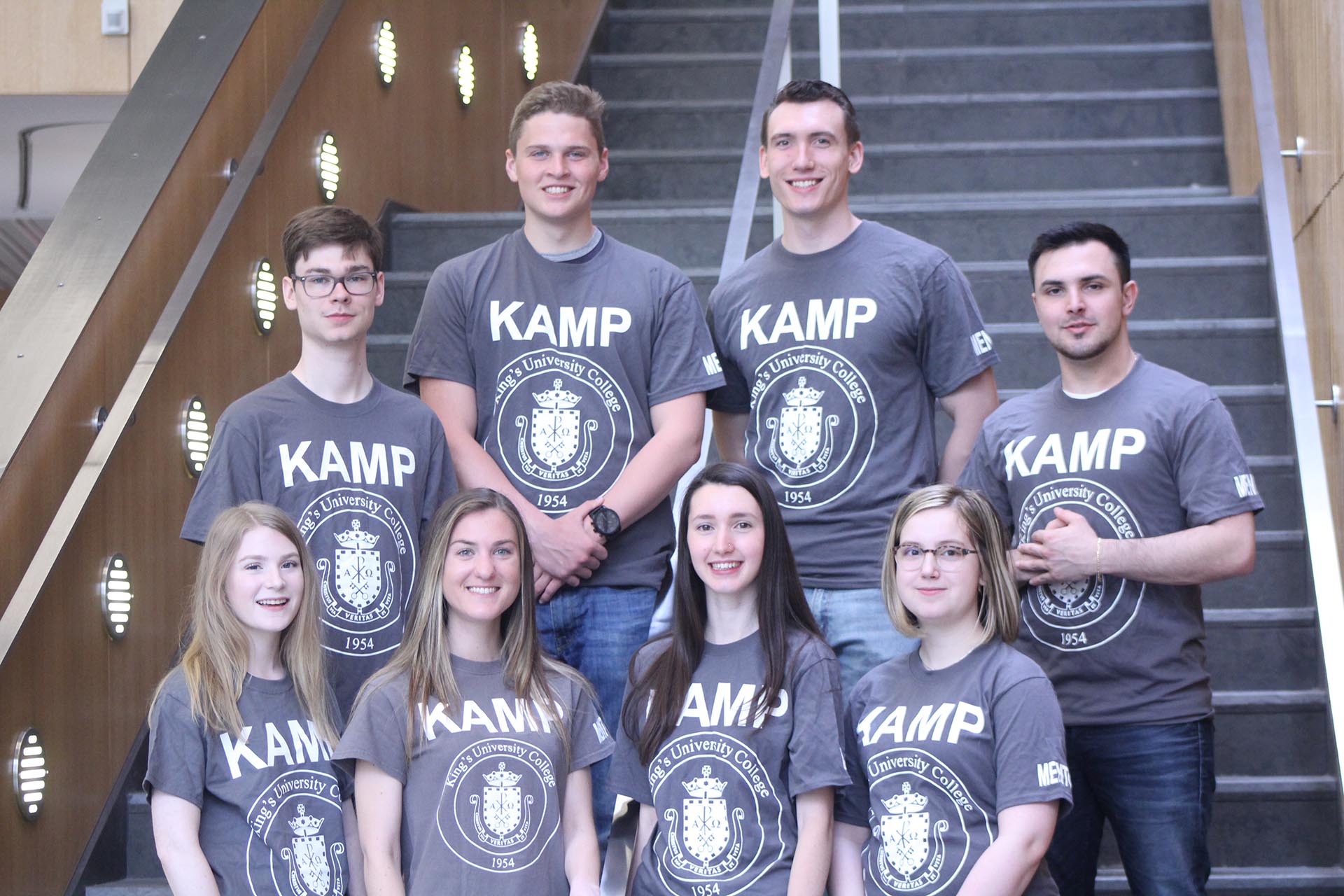 a group of people posing for a photo